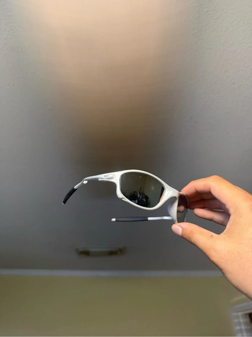 Oakley White Frame Sunglasses with Dark Lenses